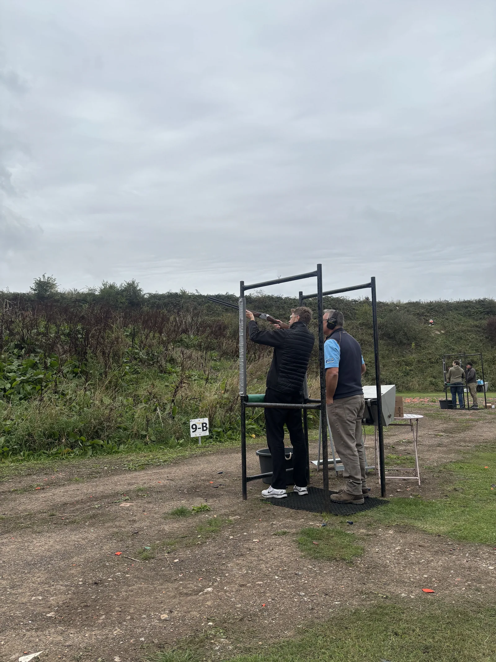 A participant clay pigeon shooting